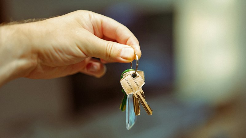 A set of keys being handed over